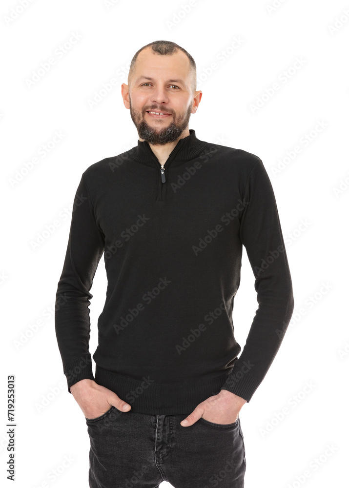 Portrait of thirty year old man with arms in his pockets smiling confident and happy, isolated on white background. Bearded caucasian man in black turtleneck posing in studio. Portrait of thirty year old man with arms in his pockets smiling confident and happy, isolated on white background. Bearded caucasian man in black turtleneck posing in studio.