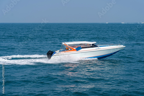Speed boat overtake in sea powerboat racing at high speed race competition.