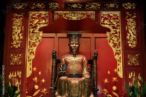 Confucius shrine statue in the Temple of Literature in Hanoi, Vietnam photo