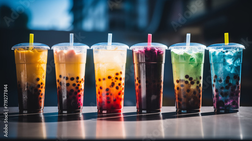 Variety of boba bubble tea. Flavored drinks with tapioca pearl photo