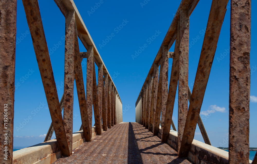 Weathered iron bridge at Fiumicino port, raised at 45 degrees Weathered iron bridge at Fiumicino port, raised at 45 degrees