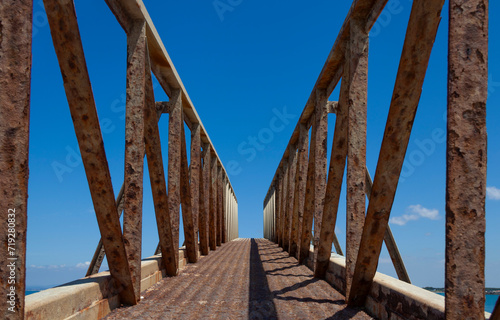 Weathered iron bridge at Fiumicino port, raised at 45 degrees