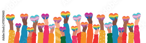 International day against homophobia, transphobia and biphobia vector. Hands holding different LGBT pride flag in heart shape. photo