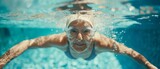 The Grace And Serenity Of An Elderly Woman Enjoying A Refreshing Swim. Сoncept Wisdom In Aging, Serene Water Moments, Embracing Life's Joys, Inner Peace In Motion