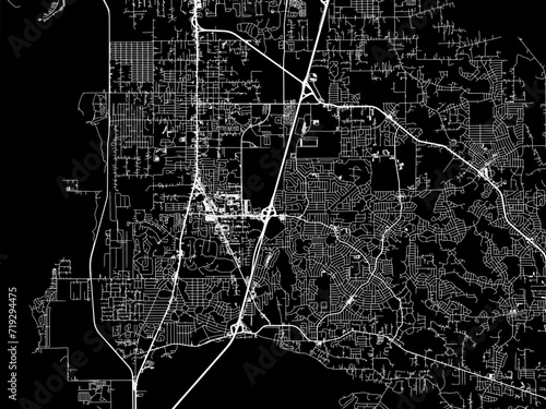 Vector road map of the city of Deltona  Florida in the United States of America with white roads on a black background. photo