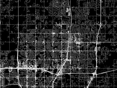 Vector road map of the city of Edmond  Oklahoma in the United States of America with white roads on a black background.