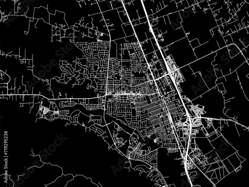 Vector road map of the city of Gilroy  California in the United States of America with white roads on a black background. photo