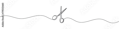 Continuous scissors with one line on a white background.