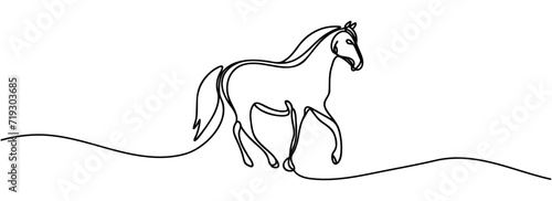 Continuous one line drawing of a horse isolated. photo
