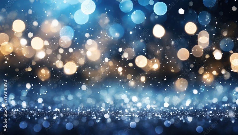 glowing in the dark defocused glitter texture with blue bokeh lights and snow christmas and winter holidays background