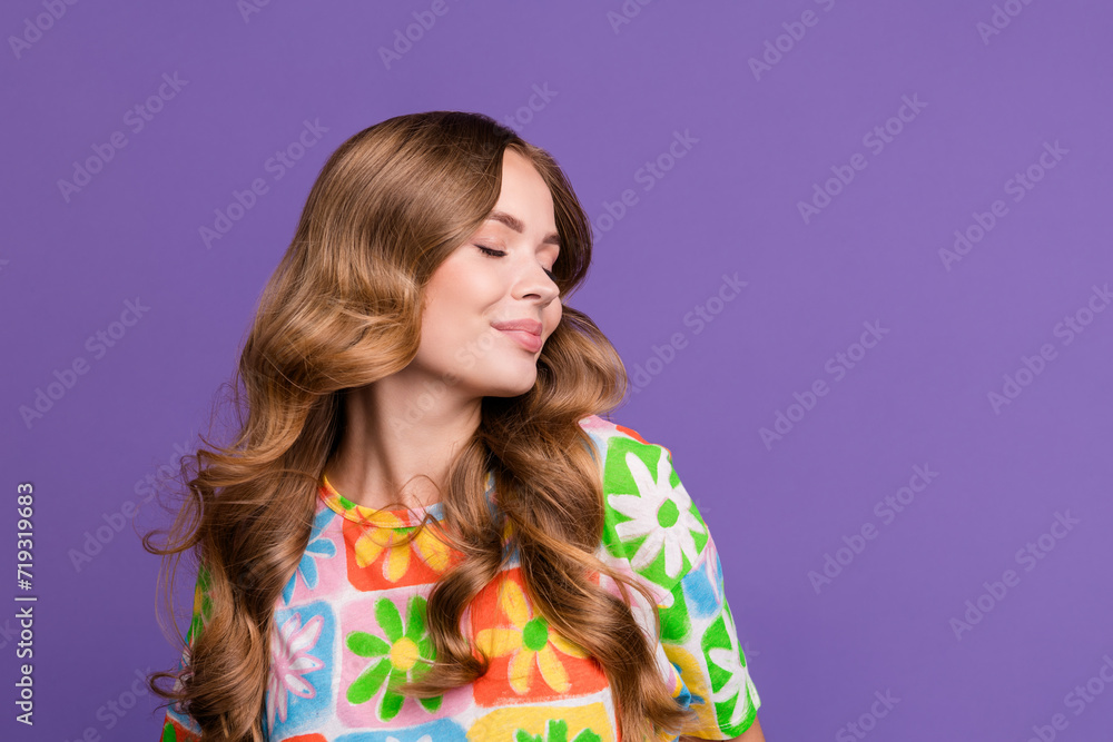 Portrait of gorgeous nice sweet girl promoting haircare gel after shower silky perfect curly hair isolated on violet color background Portrait of gorgeous nice sweet girl promoting haircare gel after shower silky perfect curly hair isolated on violet color background