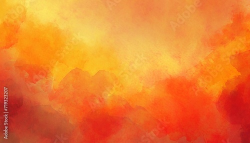red orange and yelllow background with watercolor and grunge texture design colorful textured paper in bright autumn or fall warm sunset colors photo