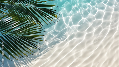 Water background with palm leaf top view. Tropical summer. © Art.disini