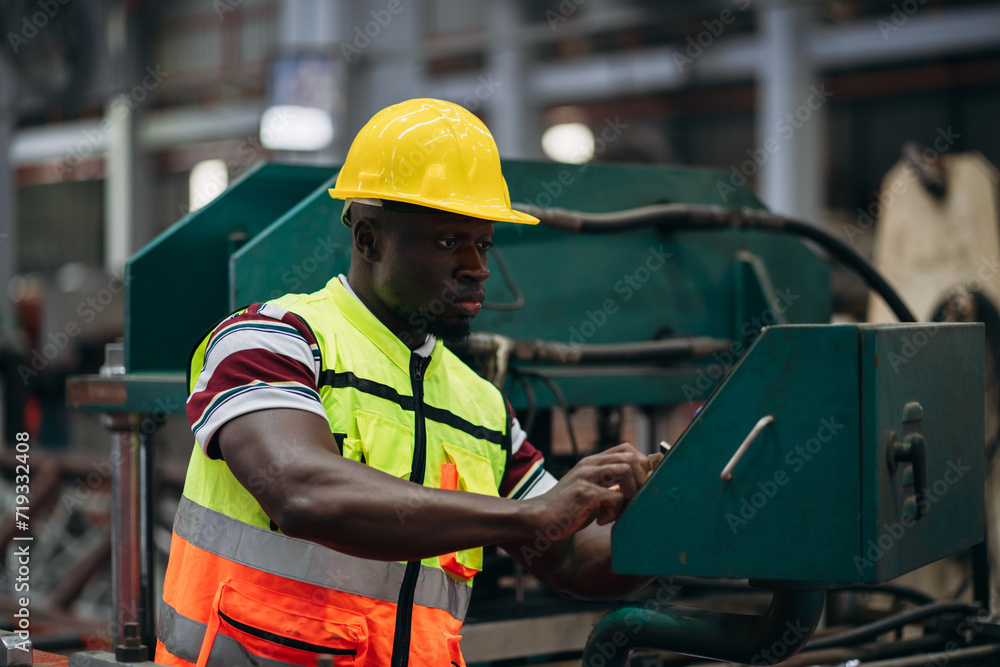 Portrait of industrial worker inspecting and check up machine at factory machines. Technician working in metal sheet at industry. Foreman checking Material or Machine. Portrait of industrial worker inspecting and check up machine at factory machines. Technician working in metal sheet at industry. Foreman checking Material or Machine.