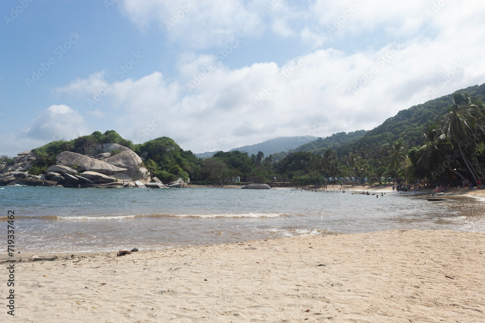Big rocky mountains with tropical jungle trees and sierra nevada mountain range at cabo san juan beach landscape