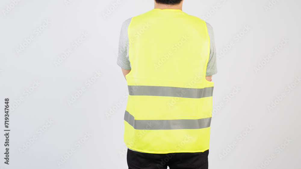 Man wear Safety Vest and turn back on white background. Stock Photo ...