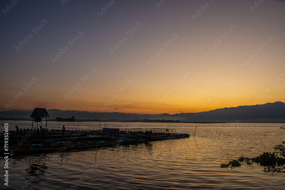 sunset twilight at Kwan Payao, Payao Province in Thailand sunset twilight at Kwan Payao, Payao Province in Thailand