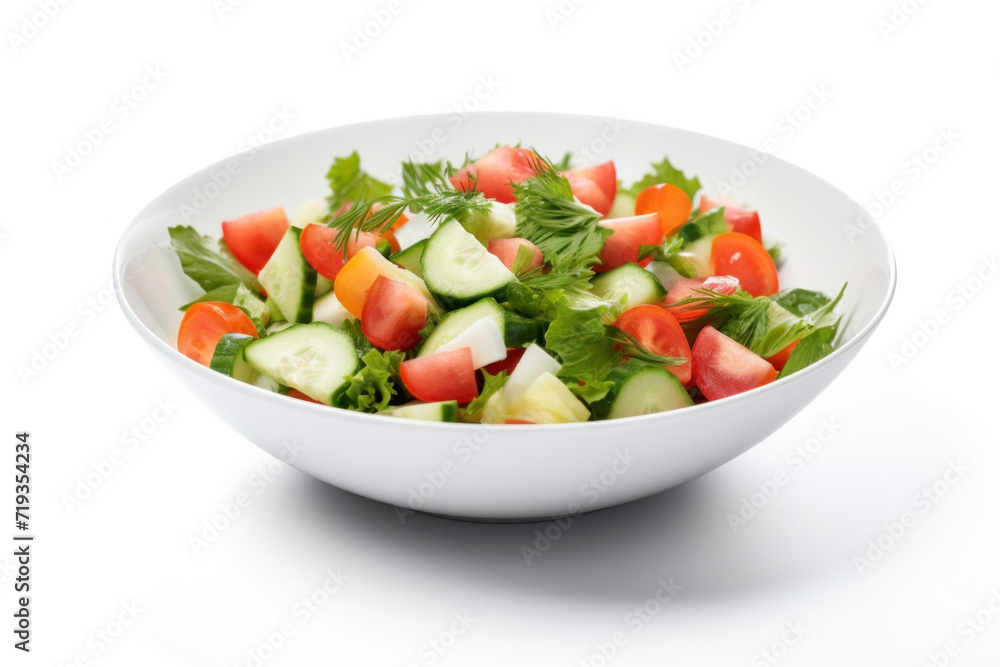Vegetable salad in a bowl isolated on white background.