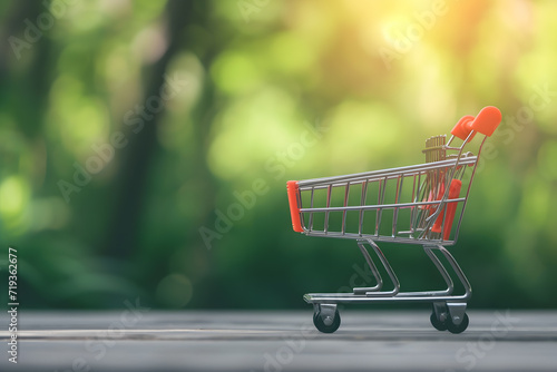 Miniature trolley for supermarket products. Online shopping or e-commerce concept