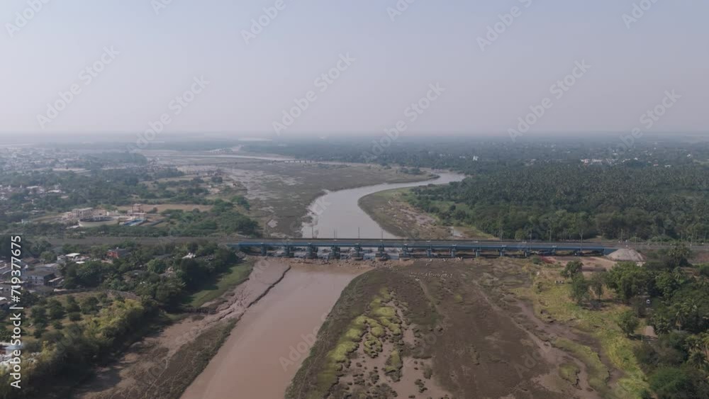 Aerial shot of Kaveri river with railway bridge located in Gujarat- India Aerial shot of Kaveri river with railway bridge located in Gujarat- India