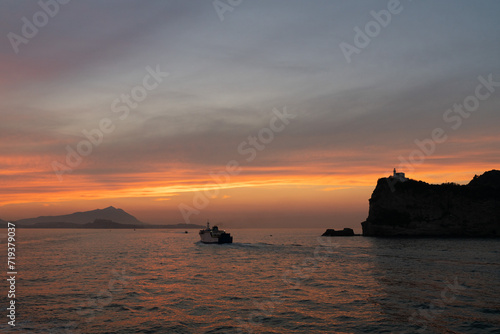 Sunset in the Campi Flegrei, land of volcanoes and terremoti. Image created from the ship that goes between Pozzuoli and Procida