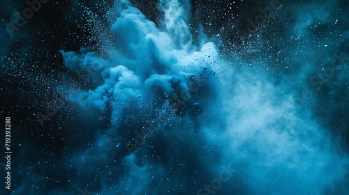  an explosion of blue dust against a black sky from be photo