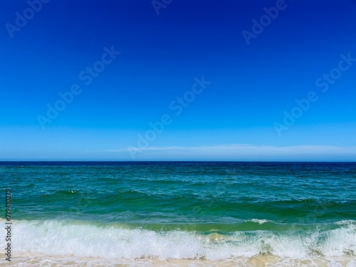 Pure blue sea horizon, blue seascape background, clear sky