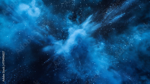  blue dust explosion on a blue background in