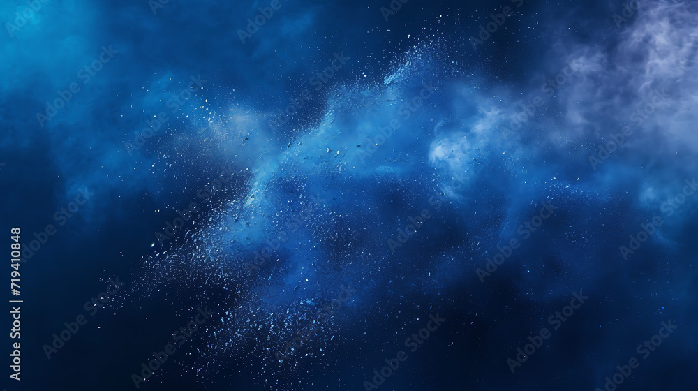  blue dust explosion on a blue background in