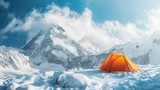 Landscape photo of a mountaineer on top of a snowy mountain with a tent.