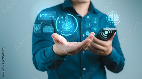 Digital Agriculture Innovation with Smart Farming Icons :Person holding a digital interface with icons representing smart farming and agricultural technology advancements.