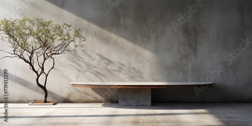 Concrete table with tree shadow on wall background  suitable for product presentation.