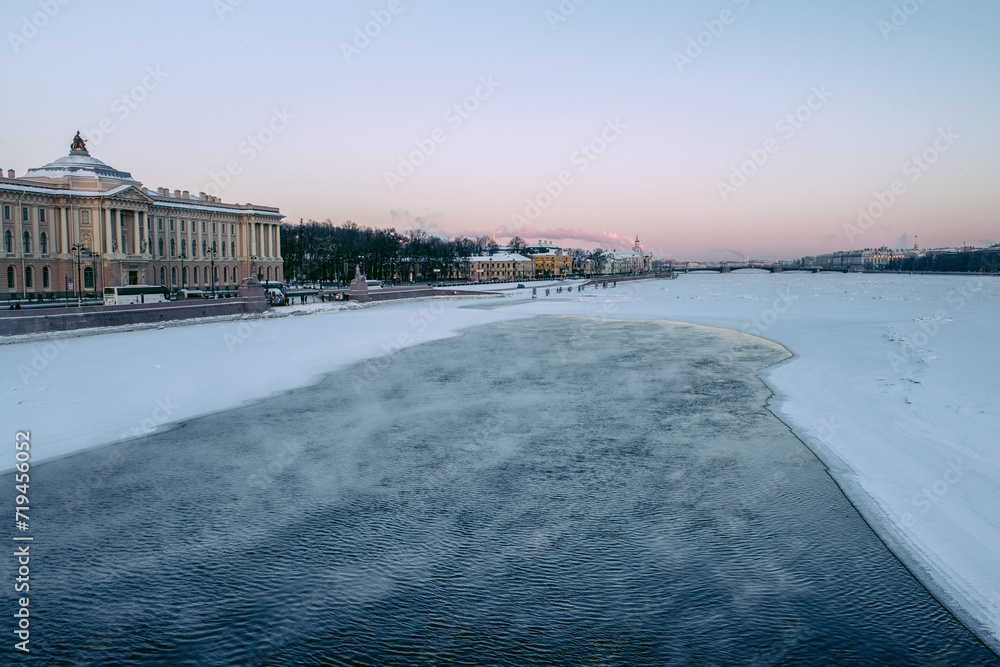 Winter landscape, steam coming from a frozen river, St.Petersburg