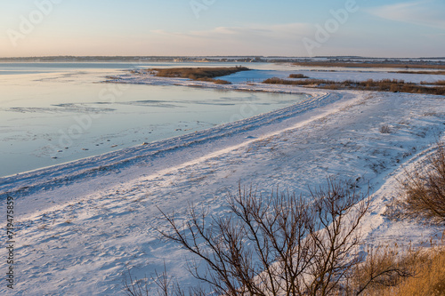 A spectacular winter landscape in the Russian countryside with waterfront. Surroundings of Taganrog.