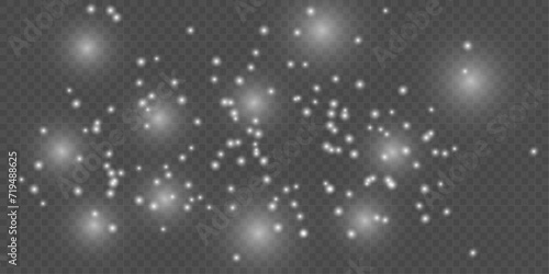 White sparks glitter special light effect. Vector sparkles on transparent background.