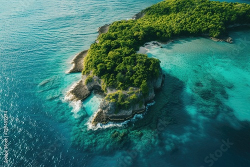 A stunning aerial view of a small island surrounded by the vast ocean. Perfect for travel brochures and advertisements