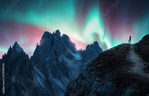 Northern lights and woman o...