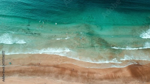 Aerial view of Nagtabon Beach in Palawan Philippines following heavy rains. stormy clouds and waves lapping onto the beach. photo