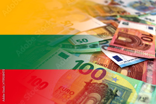 Euro banknotes colored in the colors of the flag of Lithuania. Gradient overlay of the Lithuanian flag on the euro notes.