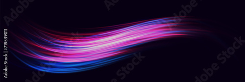 Colorful light trails, light effect movements. On a dark background.