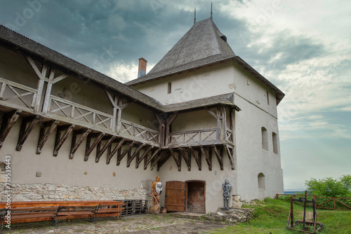 Medieval Halych Castle under stormy sky in Ukraine. photo