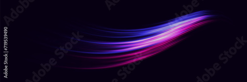 Colorful light trails, light effect movements. On a dark background.