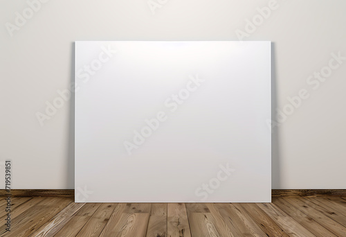  white blank poster sitting on wooden floor in