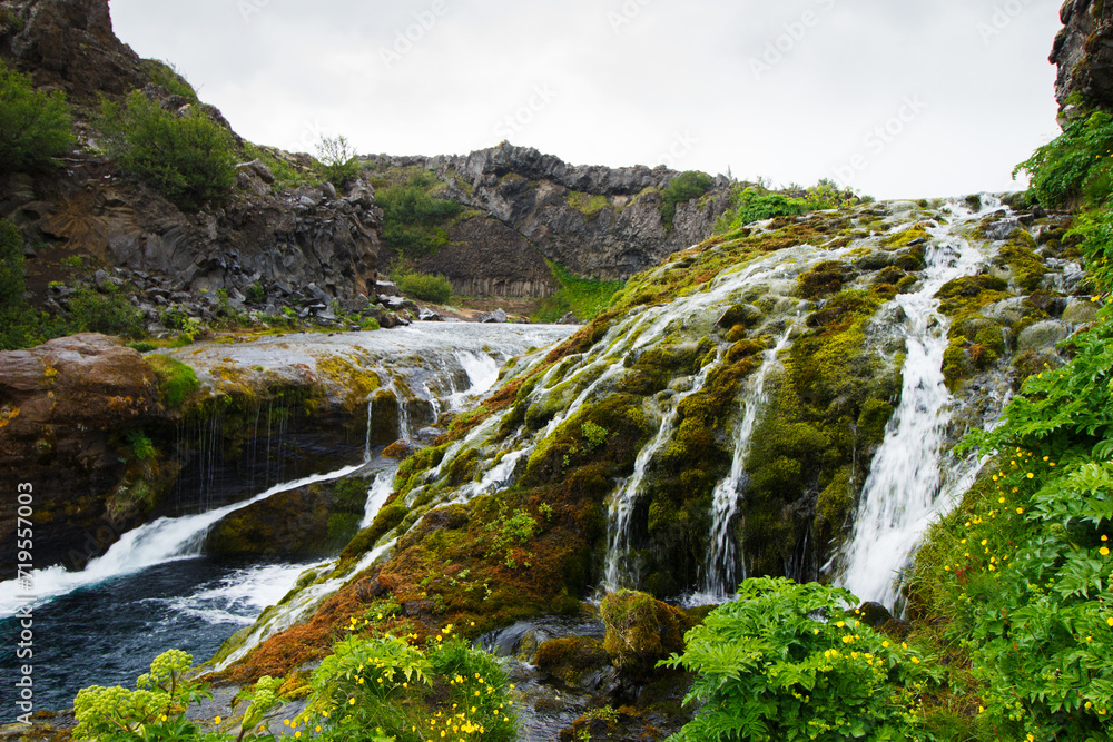 Blue Waters and River Rauda and Cacscades in Gjain Valley in Spring in the Highlands of Iceland Blue Waters and River Rauda and Cacscades in Gjain Valley in Spring in the Highlands of Iceland