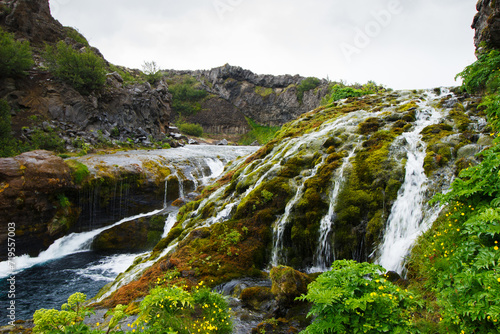 Blue Waters and River Rauda and Cacscades in Gjain Valley in Spring in the Highlands of Iceland
