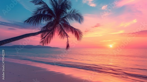 Beautiful sunset tropical beach with palm tree and pink sky © Chingiz