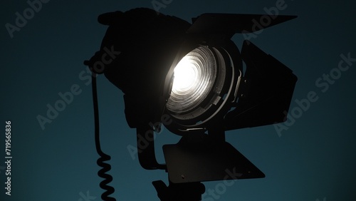 Studio light with fresnel lens and barndoors. Close-up, shallow dof. photo