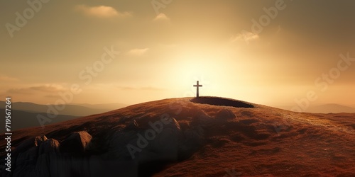 minimalistic design Christian cross on hill outdoors at sunrise.