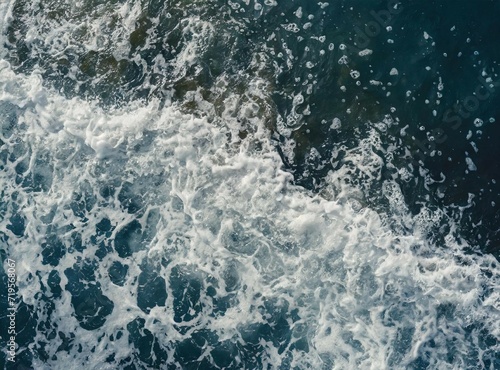 Waves with sea foam. Aerial view background/wallpaper.