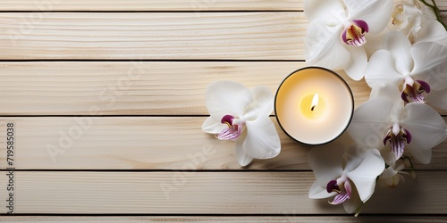 Spa still life concept Close up of spa theme on wood background with burning candle and bamboo leaf and flower 